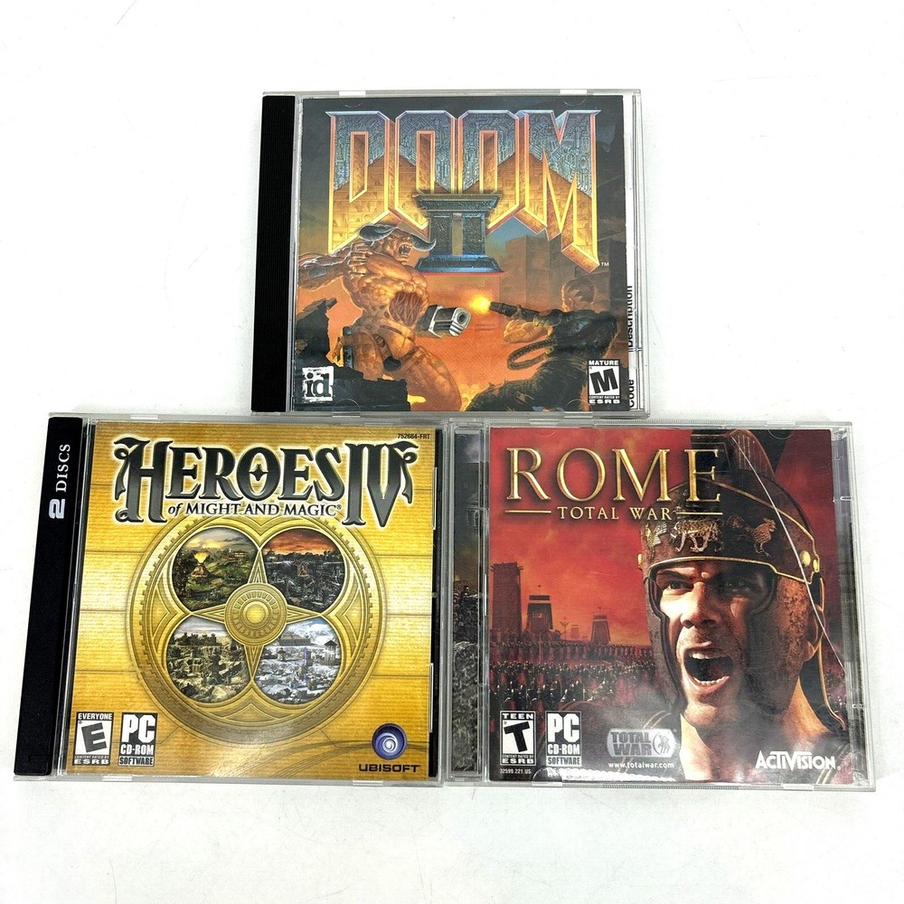 PC Game Lot Vintage Doom II, Rome Total‎ War & Heroes IV of Might & Magic CD Rom